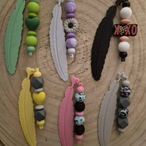 Boekenlegger veer + kralen