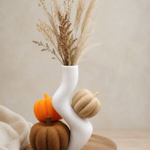 Vaas met pompoenen